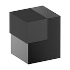 Black Style Finish Doorware 025 door stop mounted on a door to prevent movement and protect the wall from damage.
