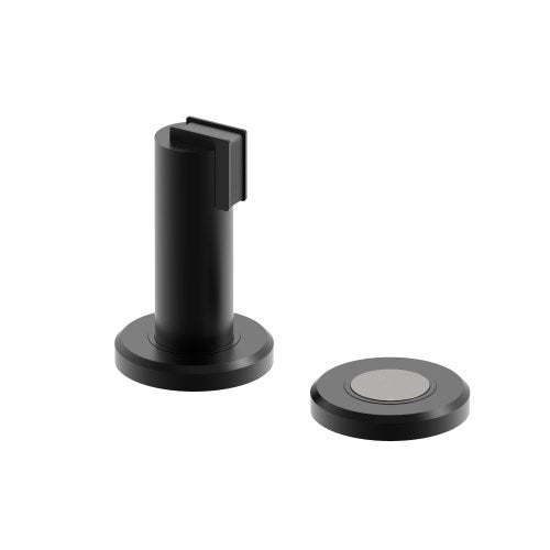 Black 530 Magnetic Door Stop and Holder by Style Finish Doorware mounted on a door and wall.