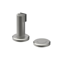 Stainless steel 530 magnetic door stop and holder by Style Finish Doorware mounted on a door and wall.