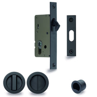Black Zanda Visca cavity sliding door privacy kit installed on a modern interior door.