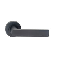 Black Madinoz Lever 014 door handle by DormaKaba, showing the sleek lever design and matte finish.