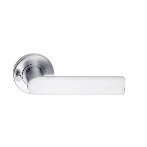 DormaKaba Madinoz Lever 014 door handle with sleek chrome finish and ergonomic design, shown installed on a modern door.