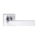 Close-up of Madinoz Lever 014 door handle by DormaKaba, showing its sleek design and polished finish.