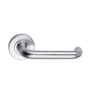 DormaKaba Madinoz Lever 018 door handle in a sleek finish, shown on a modern interior door.