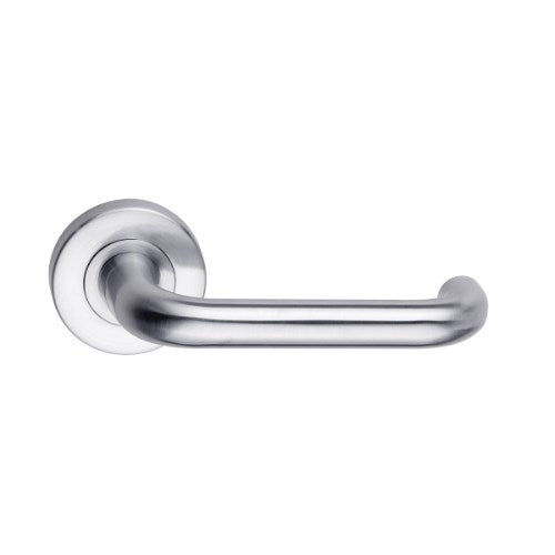 DormaKaba Madinoz Lever 018 door handle in a sleek finish, shown on a modern interior door.