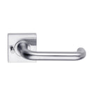DormaKaba Madinoz Lever 018 door handle in a sleek, modern design with a polished finish on a white background.