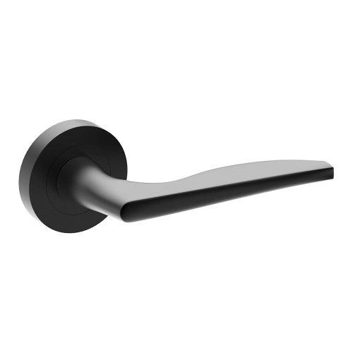 Castile door handle by Style Finish Doorware, black matte finish, mounted on door with sleek, modern design and ergonomic grip.