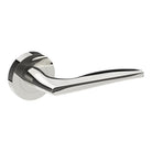 Castile door handle by Style Finish Doorware, polished stainless steel with a sleek, modern design mounted on a door.