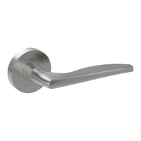 Castile door handles by Style Finish Doorware, three sleek stainless steel door handles with modern design.