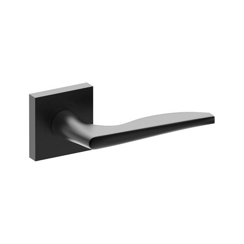 Black Castile door handle by Style Finish Doorware, shown on interior door with modern lever design.
