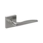 Castile door handle by Style Finish Doorware, stainless steel finish, sleek lever design mounted on door.