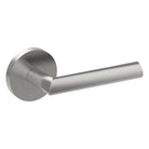 Stainless steel COMO door handle by Style Finish Doorware mounted on a door, showcasing modern design and sleek finish.