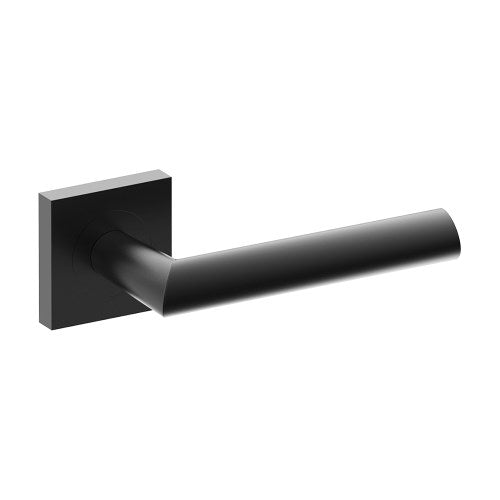 Black COMO door handle by Style Finish Doorware mounted on a door, showcasing modern hardware design.