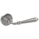 Stainless steel Elegante door handle by Style Finish Doorware mounted on a modern door.