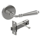 Style Finish Doorware ELEGANTE door handle mounted on a door, showcasing sleek metal design and polished finish.