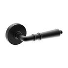Black LATINA door handle by Style Finish Doorware mounted on a door with a sleek modern design.