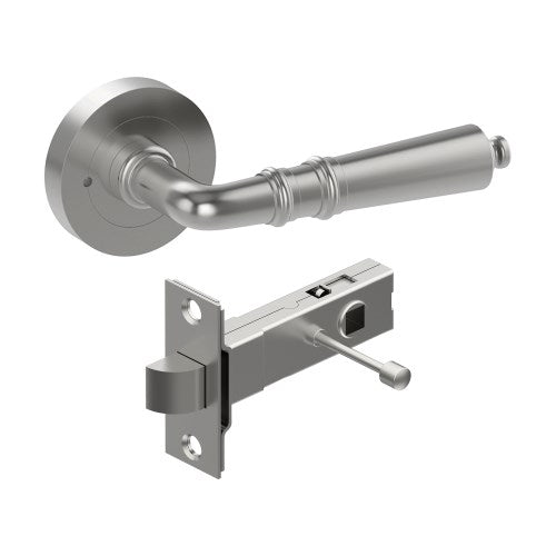 LATINA door handle by Style Finish Doorware with a sleek, satin stainless steel finish, mounted on a door.