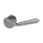 Stylish LATINA door handle by Style Finish Doorware, silver finish, modern design, mounted on door with visible latch.