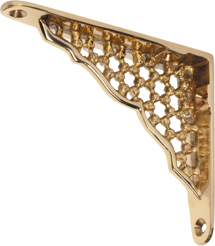 Decorative ornate shelf bracket by Tradco, Southern Design Group, featuring intricate metalwork for supporting shelves in rustic or vintage style.